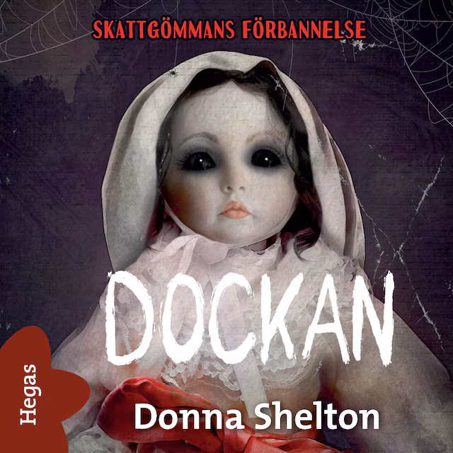Omslag: Dockan